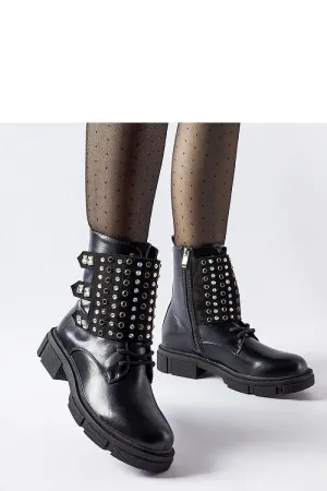Black boots adorned with rhinestones