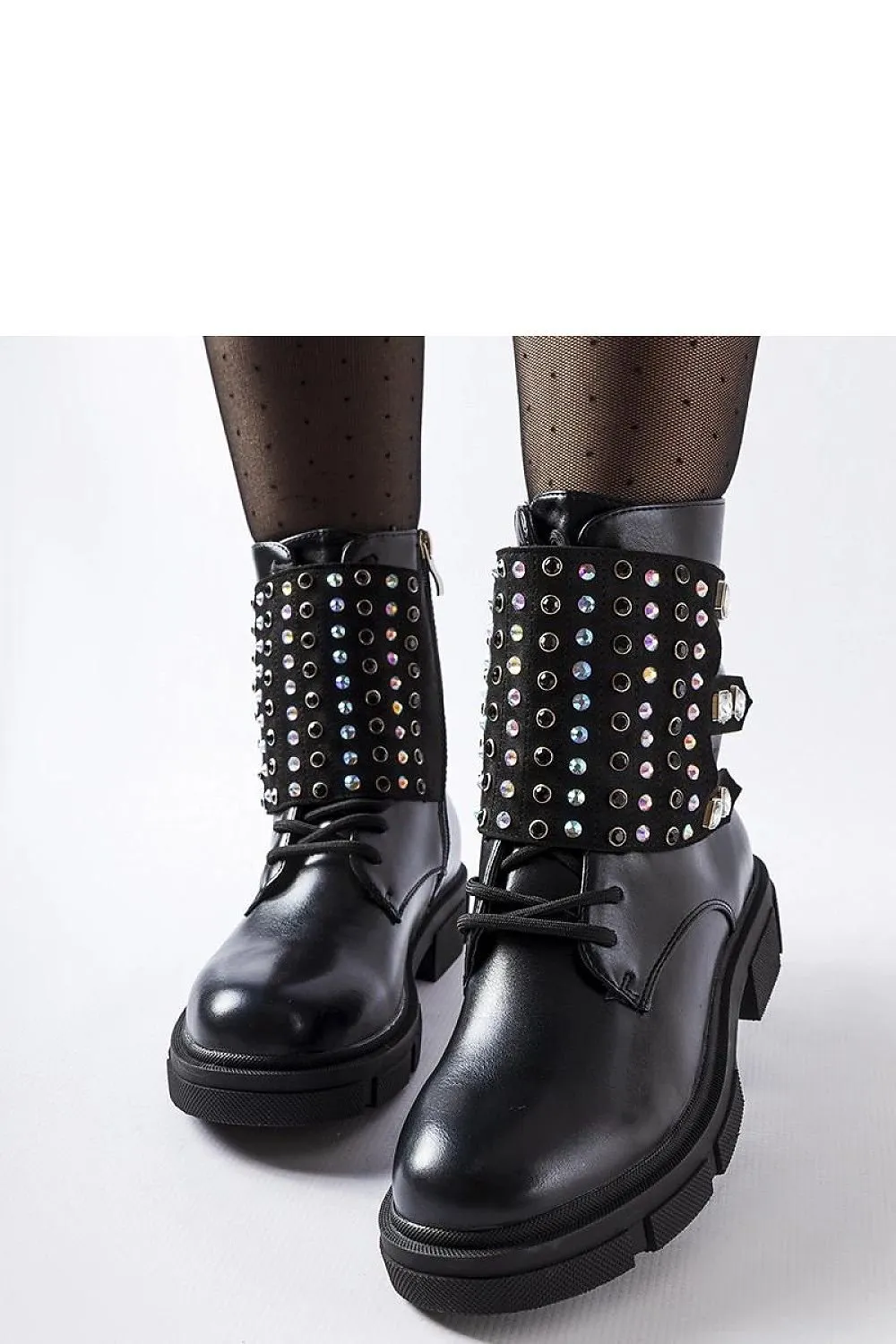 Black boots adorned with rhinestones