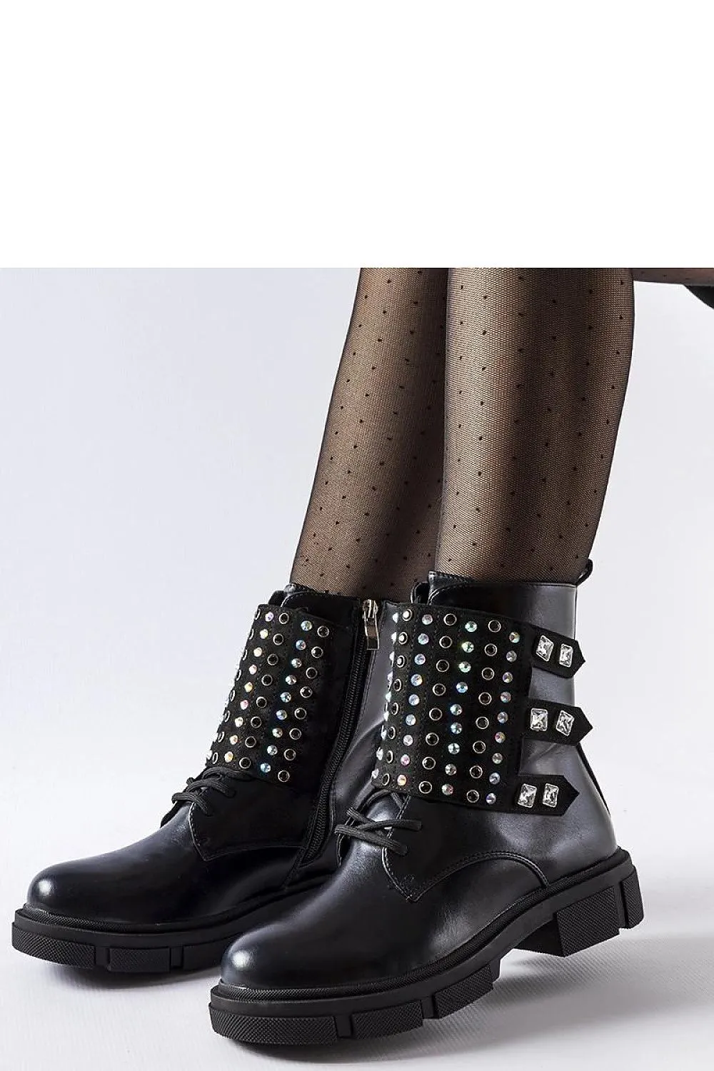 Black boots adorned with rhinestones