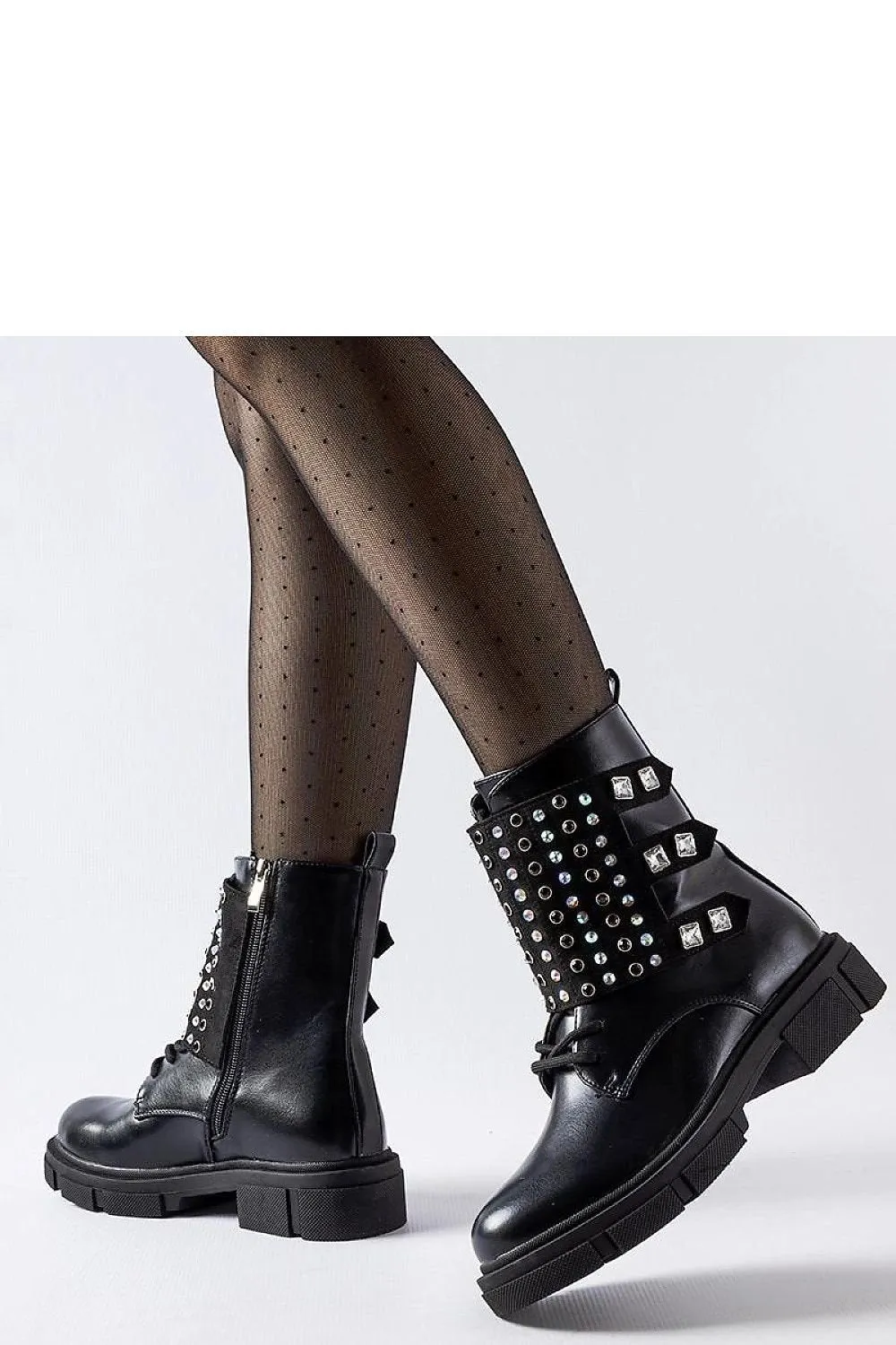 Black boots adorned with rhinestones
